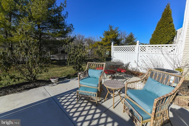 view of patio / terrace with an outdoor hangout area and central AC unit