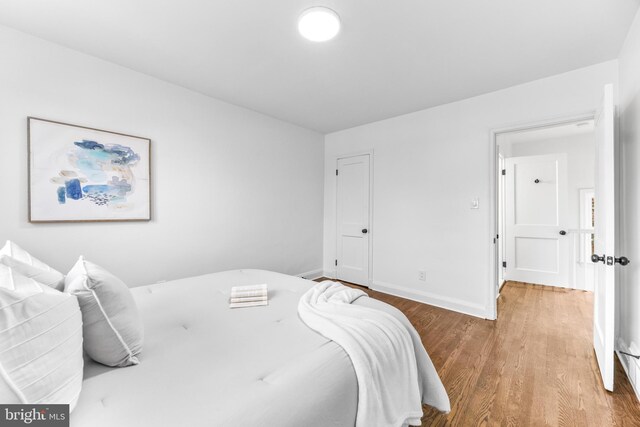 bedroom featuring hardwood / wood-style floors