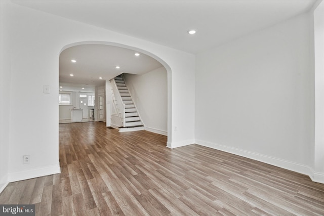 unfurnished living room featuring light hardwood / wood-style flooring