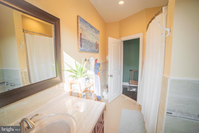 bathroom with vanity and tile patterned flooring