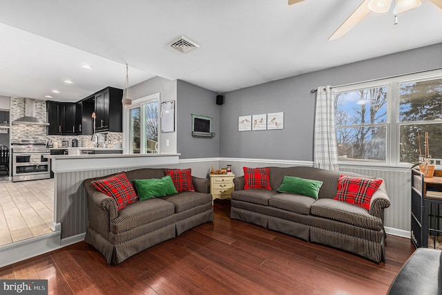 living room featuring dark hardwood / wood-style flooring