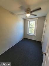 empty room featuring ceiling fan