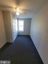 unfurnished room with ceiling fan