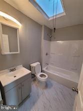 full bathroom with toilet, bathing tub / shower combination, and vanity