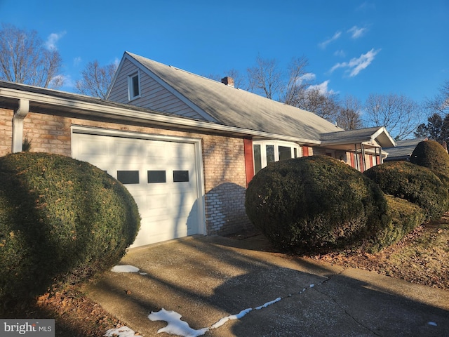 view of home's exterior with a garage