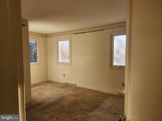 view of carpeted spare room