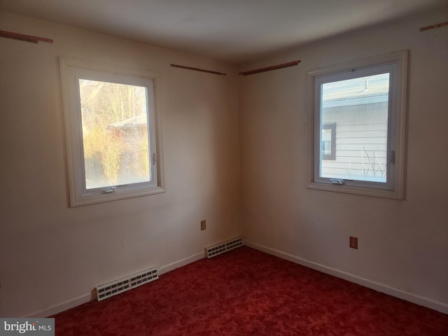 view of carpeted spare room