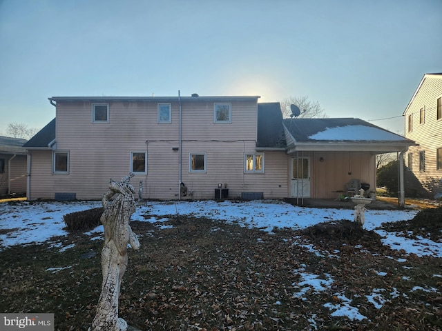 view of snow covered property