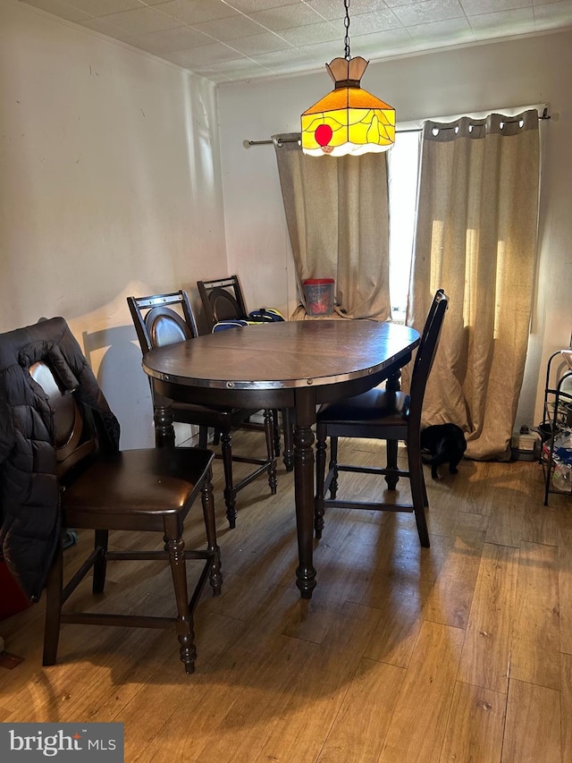 dining area with hardwood / wood-style flooring