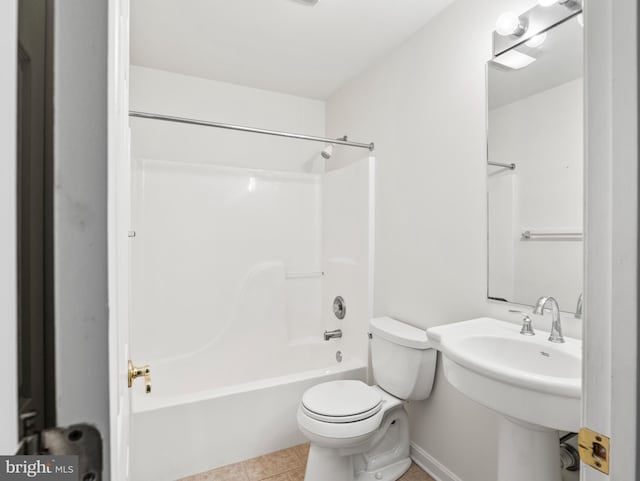 bathroom with shower / tub combination, tile patterned flooring, and toilet