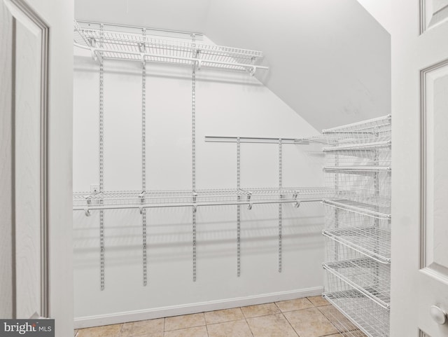 walk in closet featuring light tile patterned floors