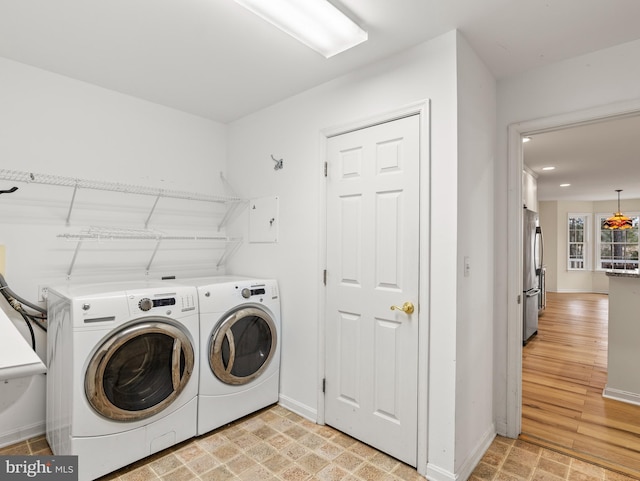 washroom featuring separate washer and dryer