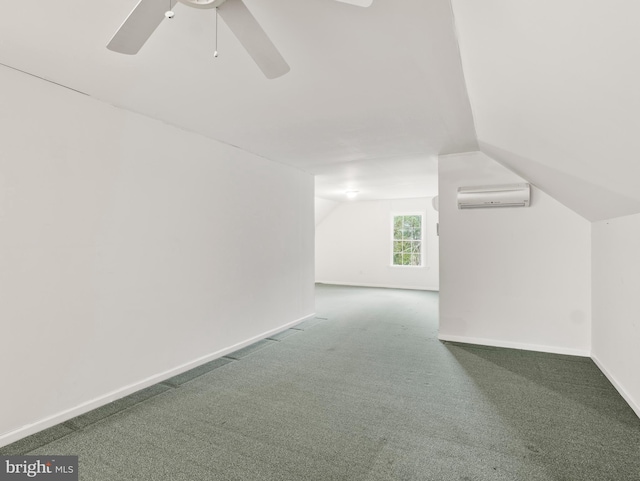 bonus room with ceiling fan, vaulted ceiling, carpet, and a wall unit AC