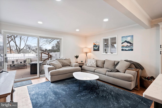 living room featuring dark hardwood / wood-style floors, beam ceiling, and ornamental molding