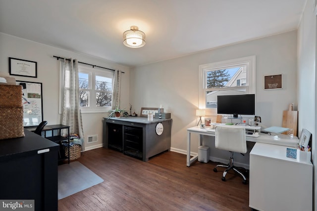 office space with dark hardwood / wood-style floors