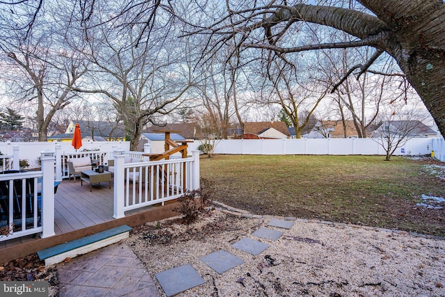 view of yard featuring a wooden deck