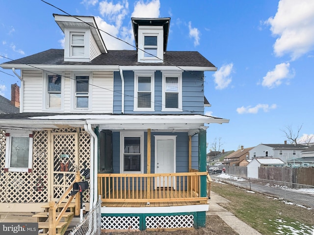 view of front of home featuring covered porch