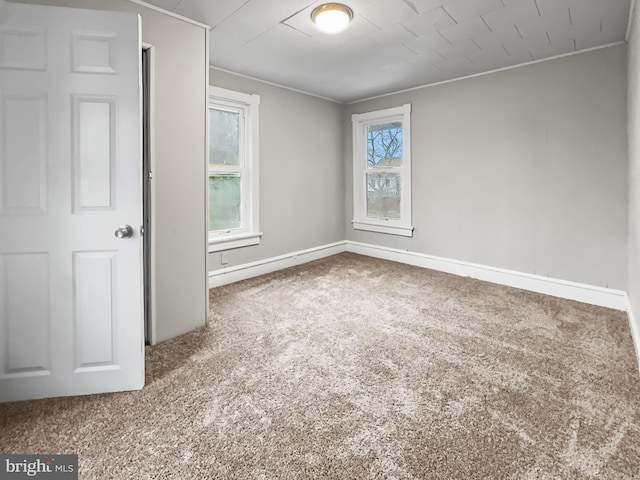 view of carpeted spare room