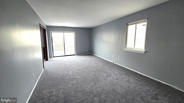 view of carpeted spare room