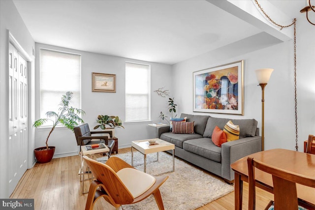 living room with light hardwood / wood-style floors