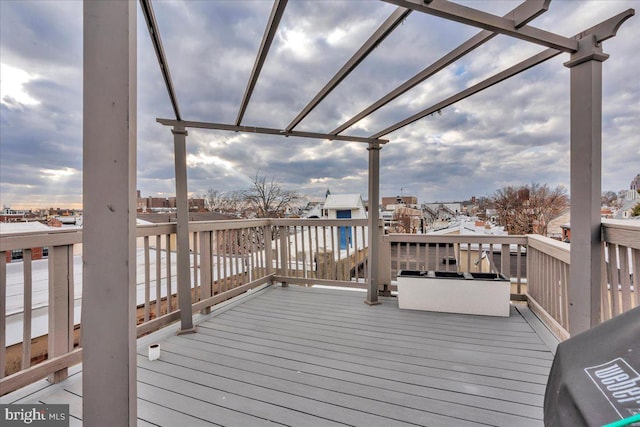 wooden terrace featuring a pergola