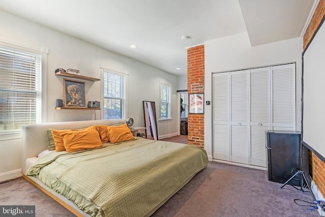 bedroom featuring a closet and carpet