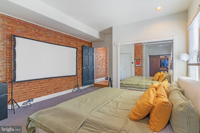 bedroom with brick wall