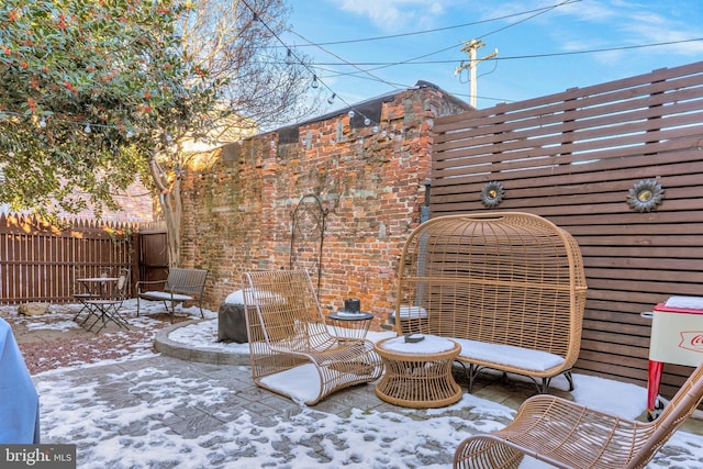 view of snow covered patio