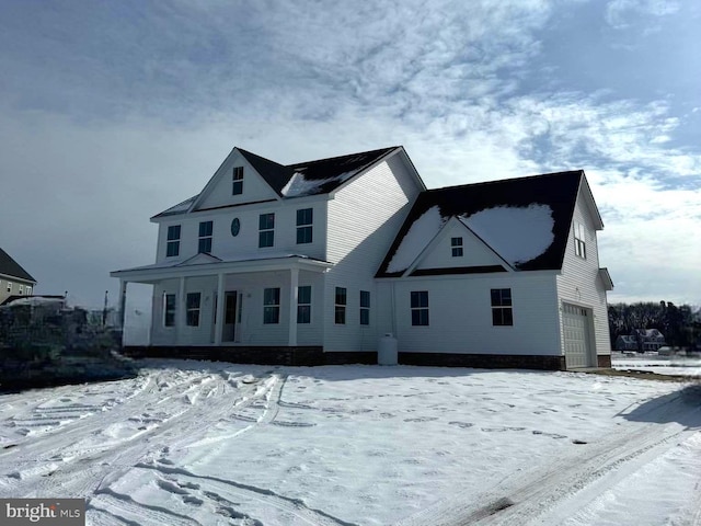 view of front of property featuring a garage