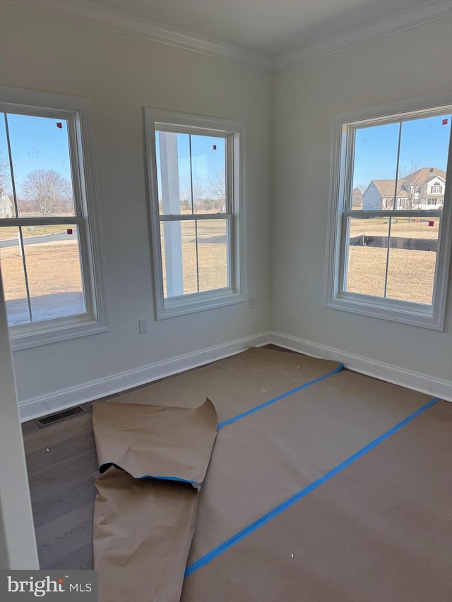 interior space with ornamental molding