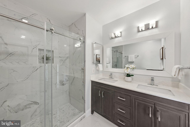 bathroom with vanity and an enclosed shower