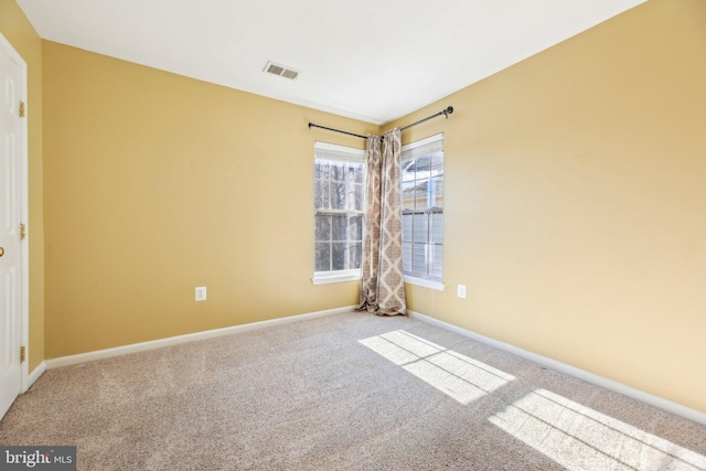 view of carpeted spare room