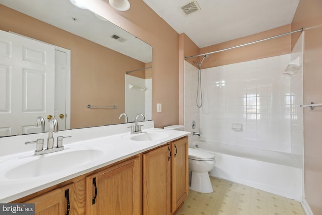 full bathroom featuring toilet, bathtub / shower combination, and vanity