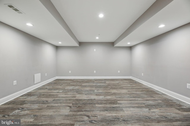 empty room with dark hardwood / wood-style floors