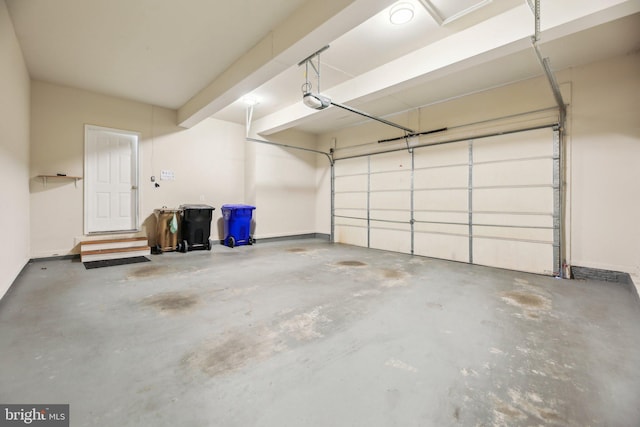 garage featuring a garage door opener