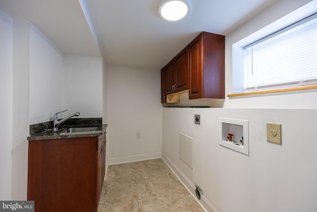 laundry area featuring hookup for an electric dryer, cabinets, sink, and washer hookup