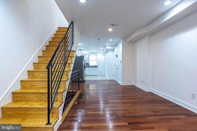 interior space featuring dark wood-type flooring