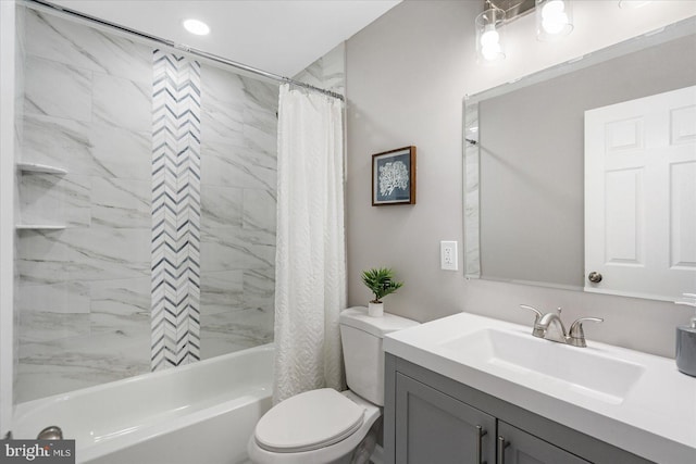 full bathroom featuring toilet, vanity, and shower / tub combo