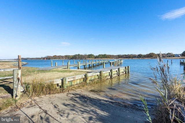 dock area featuring a water view