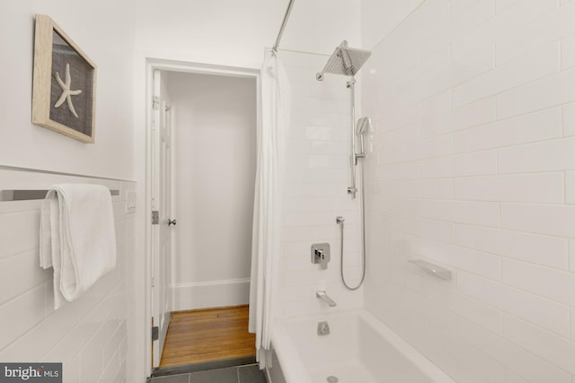 bathroom featuring shower / bath combination with curtain