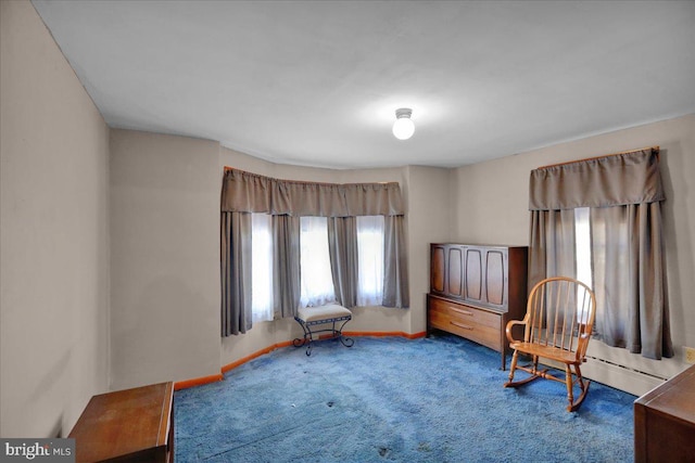 sitting room with carpet and baseboards