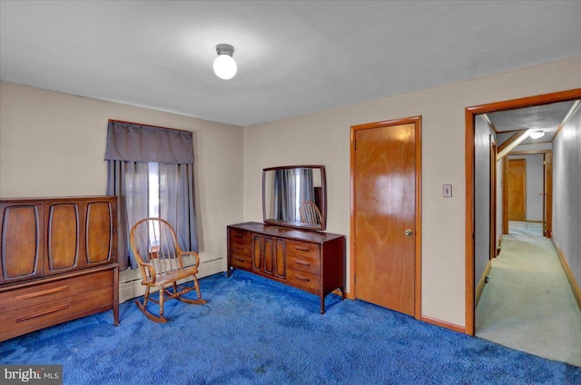 carpeted bedroom featuring a baseboard radiator and baseboards