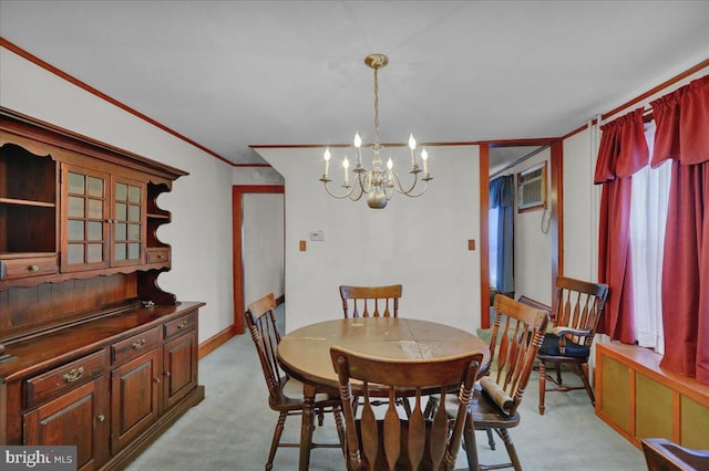 dining area with light carpet, baseboards, ornamental molding, an inviting chandelier, and a wall mounted AC