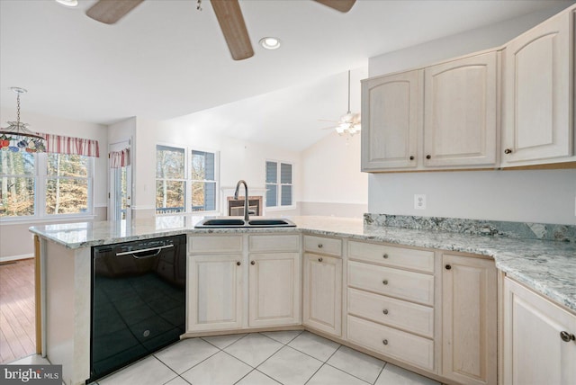 kitchen featuring sink, vaulted ceiling, black dishwasher, light tile patterned floors, and kitchen peninsula