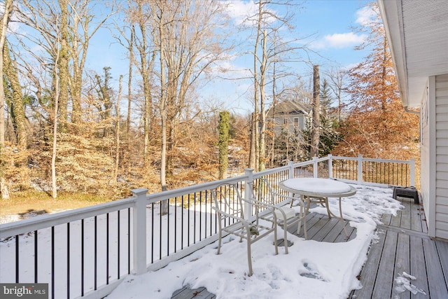 view of snow covered deck