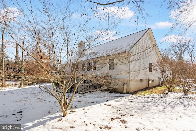 view of snow covered property