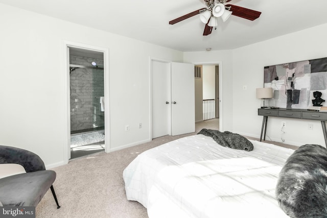 carpeted bedroom featuring ceiling fan and connected bathroom