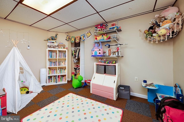 bedroom featuring a paneled ceiling