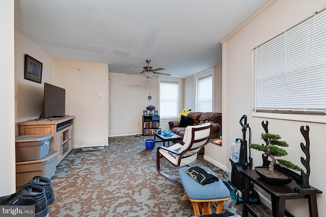 living room featuring ceiling fan