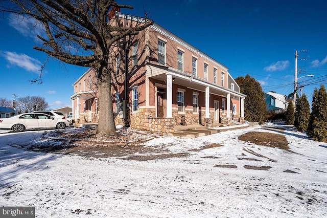 view of snow covered property